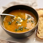 a bowl of garnished leek and pumpkin soup