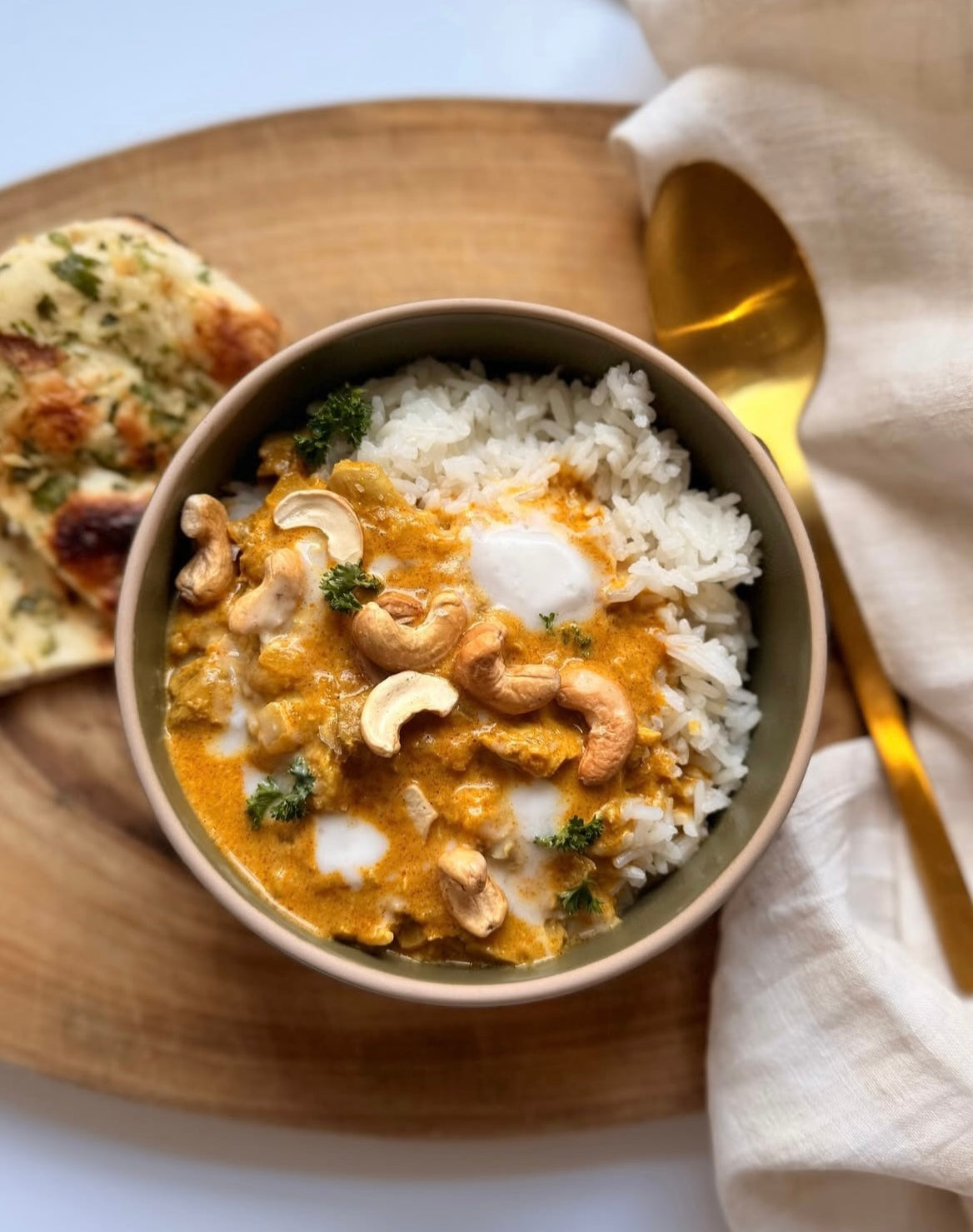 coconut butter chicken plated and garnished
