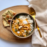 dairy free butter chicken plated and garnished