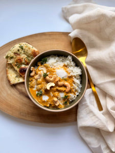 dairy free butter chicken plated and garnished